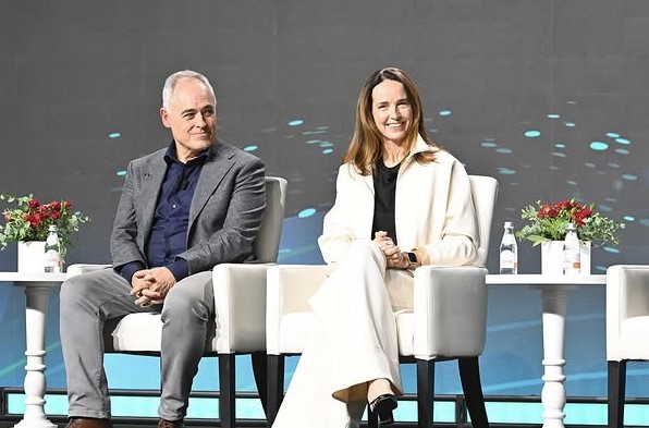 Ángel Cabrera sits next to Sarah Friar at the Global HOPE Forum on Dec. 9, 2024