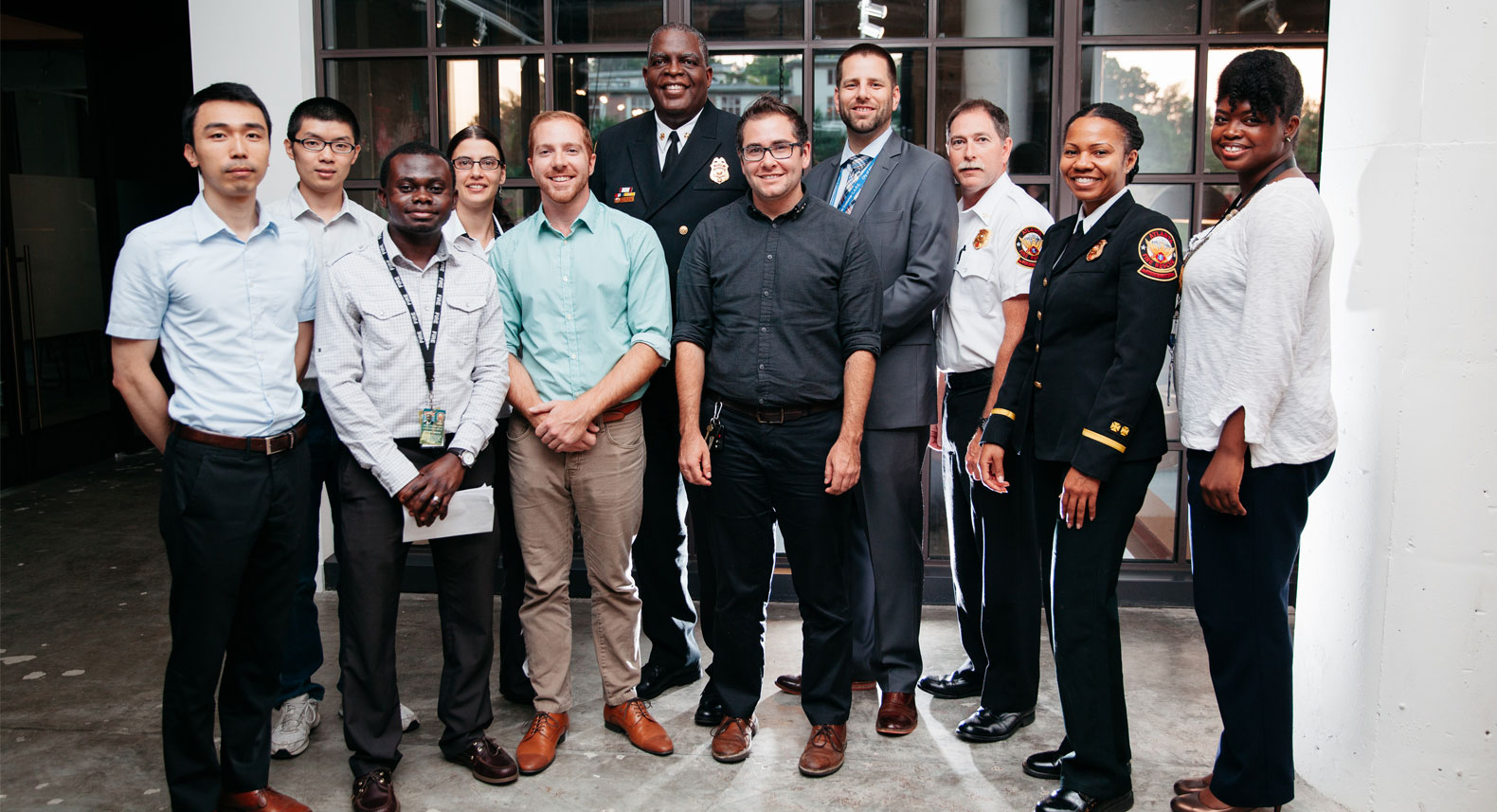 Group photo of Data Science for Social Good students with City of Atlanta Fire Rescue Department leaders