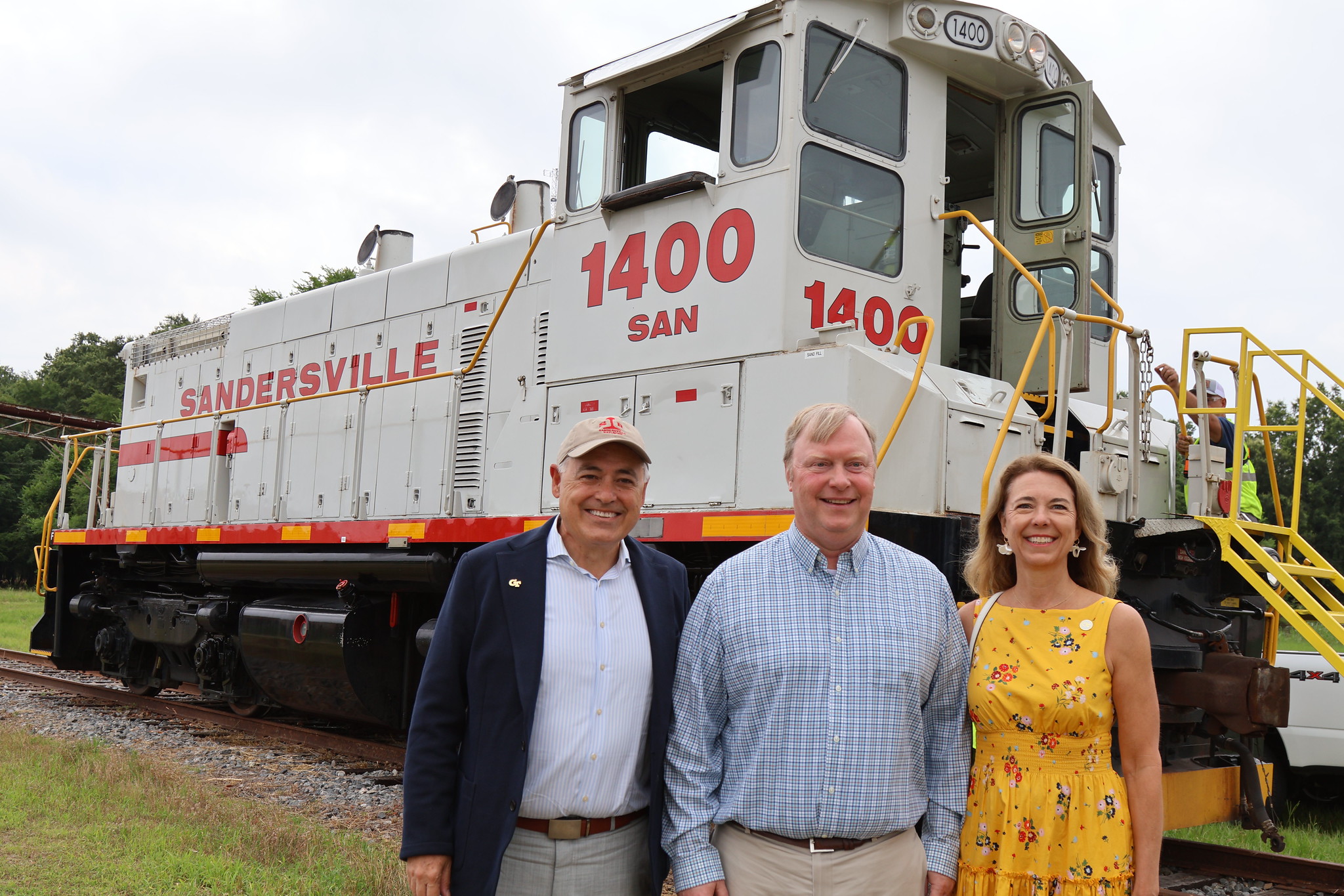 President Cabrera and Dr. Beth Cabrera with alumni Benjamin Tarbutton III in from Sandersville train. 