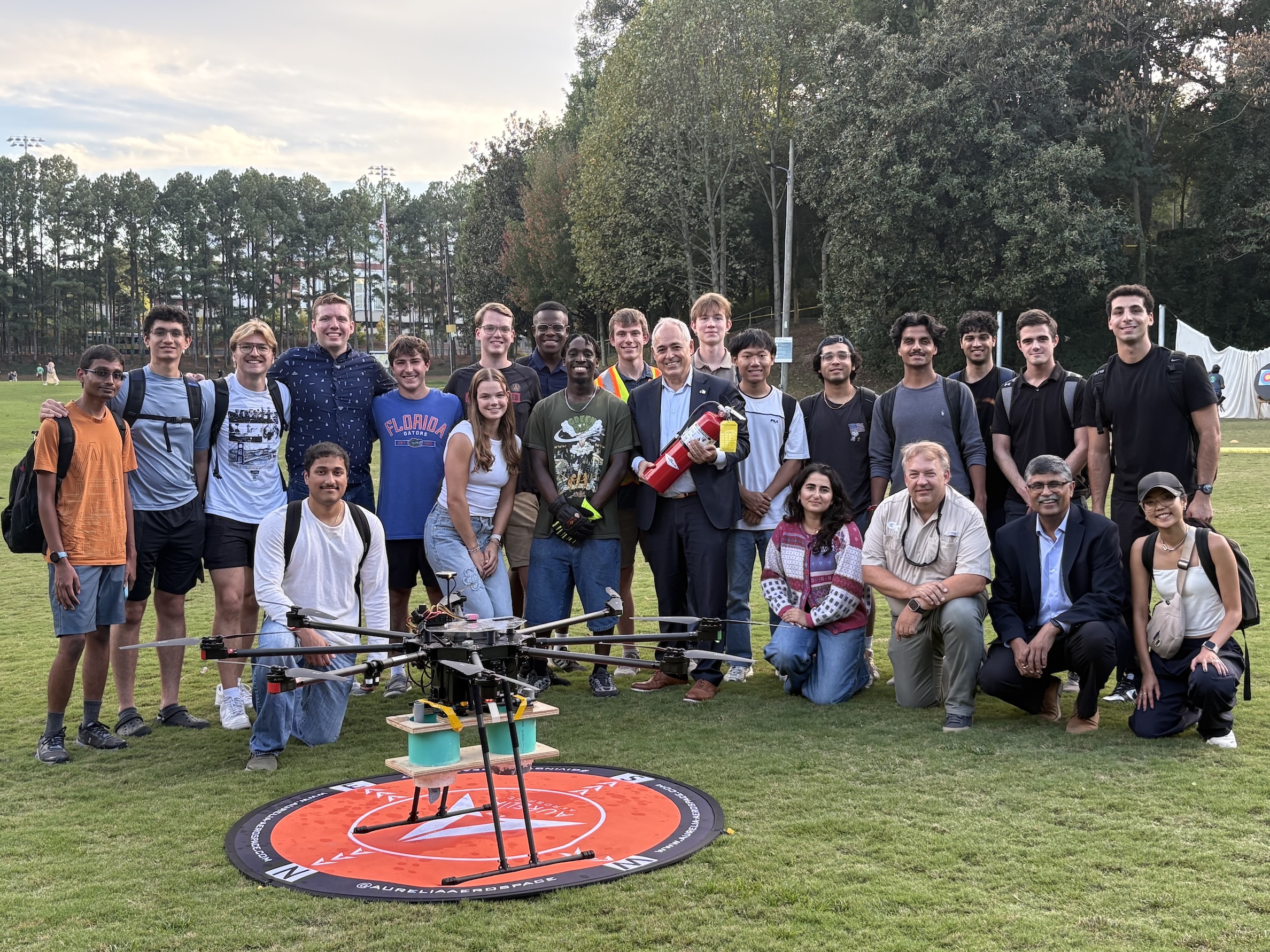 President Cabrera gathers with the members of the FlameJackets, a VIP team at Georgia Tech.