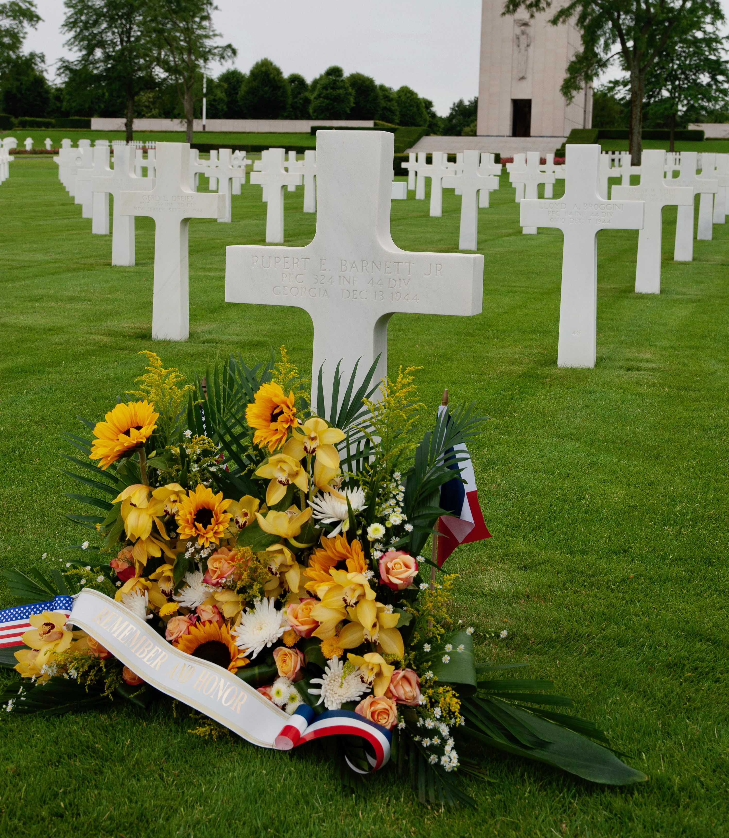 The gravestone of Rupert E. Barnett Jr., a member of Georgia Tech's Class of 1945 and a U.S. Army private first class with the 324th Infantry Regiment, 44th Infantry Division, who was killed in action in France months before he was scheduled to graduate.